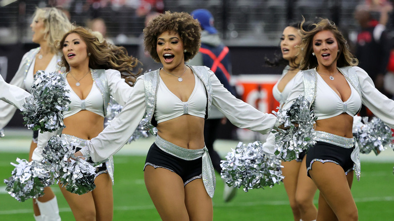 Raiders cheerleaders performing on game day 