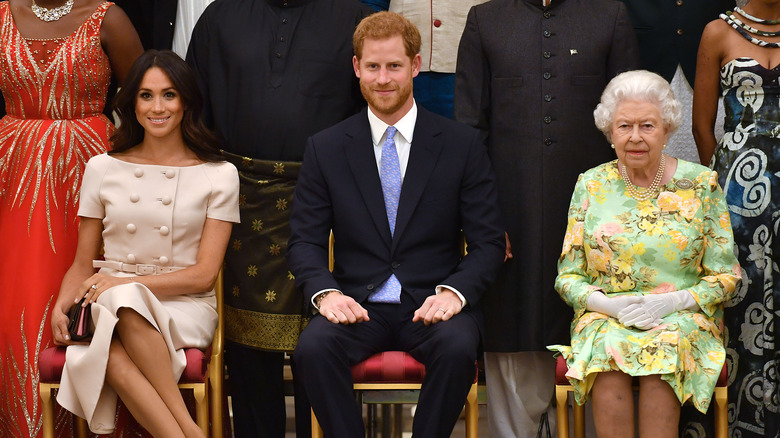 Meghan Markle, Prince Harry, and Queen Elizabeth II