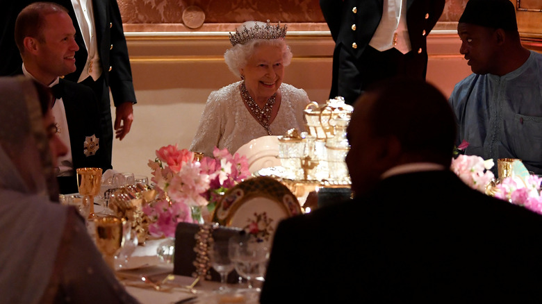 Queen Elizabeth II enjoys dinner 