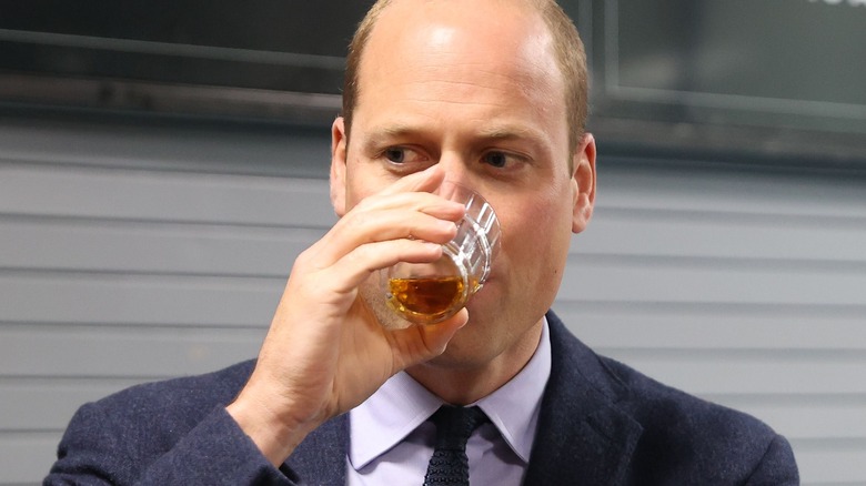 Prince William sips liquor