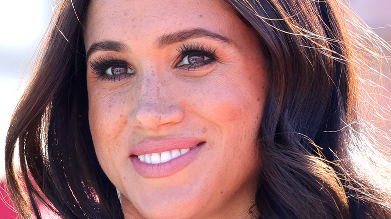 Meghan Markle smiling close-up