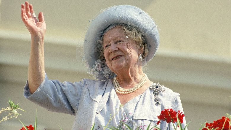 The Queen Mother waves