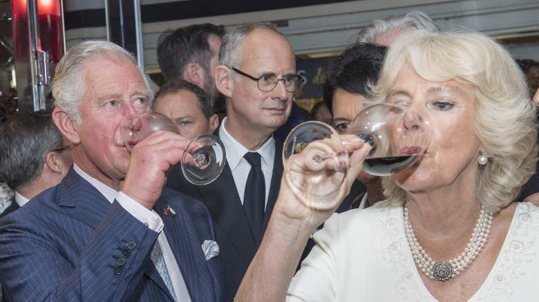 Charles and Camilla drinking wine