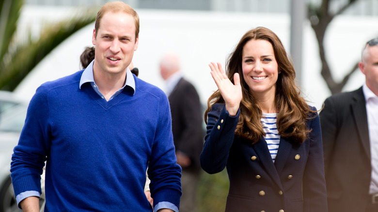 Prince William makes a face while Kate Middleton waves