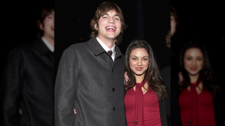 Ashton Kutcher and Mila Kunis smiling