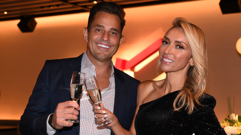 Bill and Giuliana Rancic with champagne