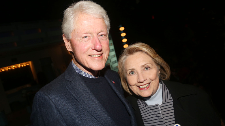 Bill and Hillary Clinton smiling