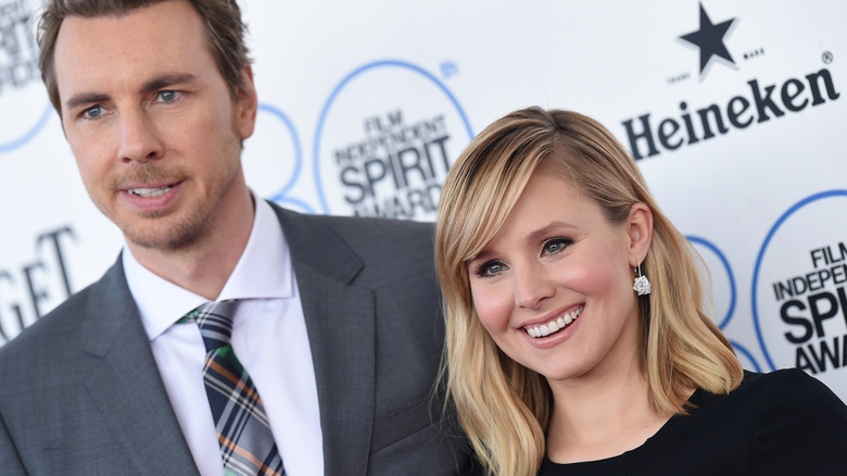 Dax Shepard and Kristen Bell posing at the Film Independent Spirit Awards