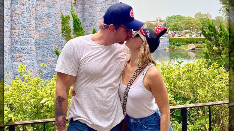 Dax Shepard and Kristen Bell kissing at Disneyland