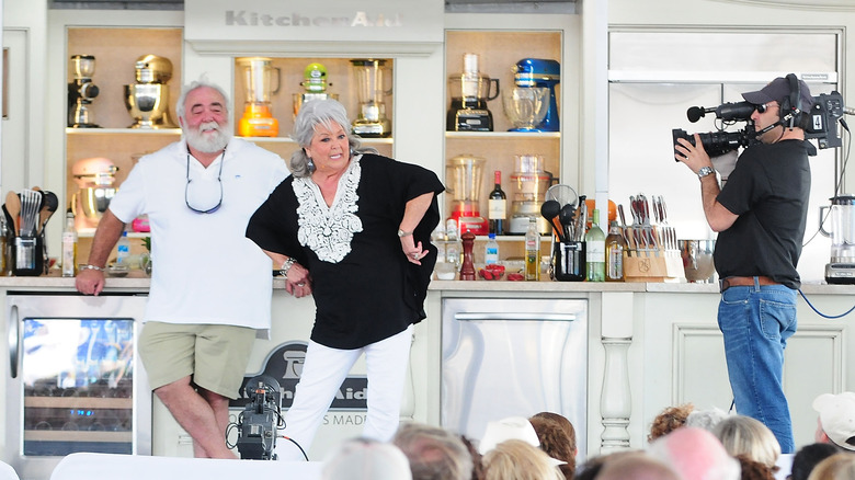 Michael Groover and Paula Deen being filmed on set