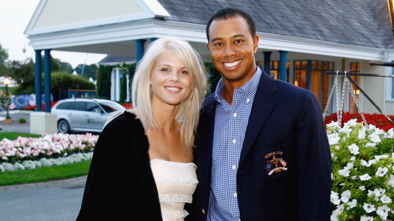 Tiger Woods smiling with Elin Nordegren