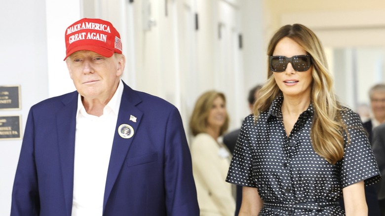 Donald Trump and Melania Trump walking side-by-side