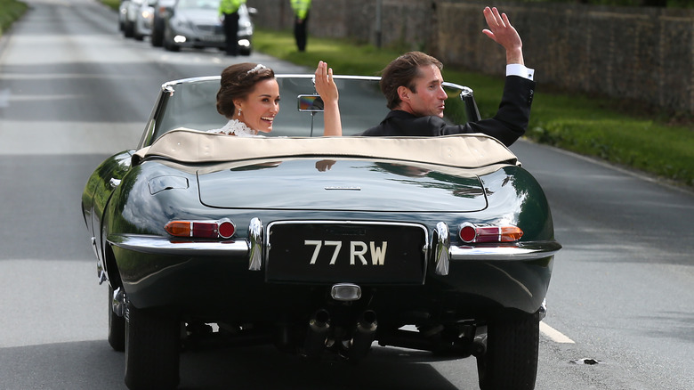 Pippa Middleton and James Matthews waving 