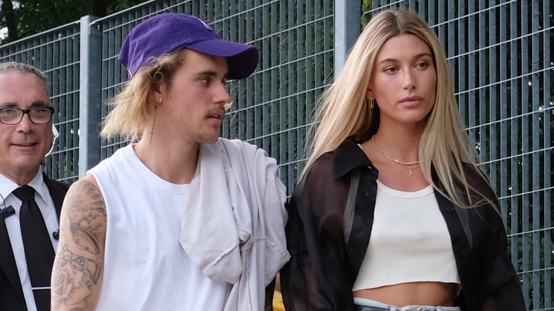 Justin Bieber and Hailey Bieber attending event during Fashion Week