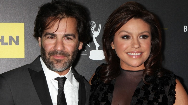 John Cusimano and Rachael Ray posing on the red carpet at the 2012 Daytime Emmy Awards