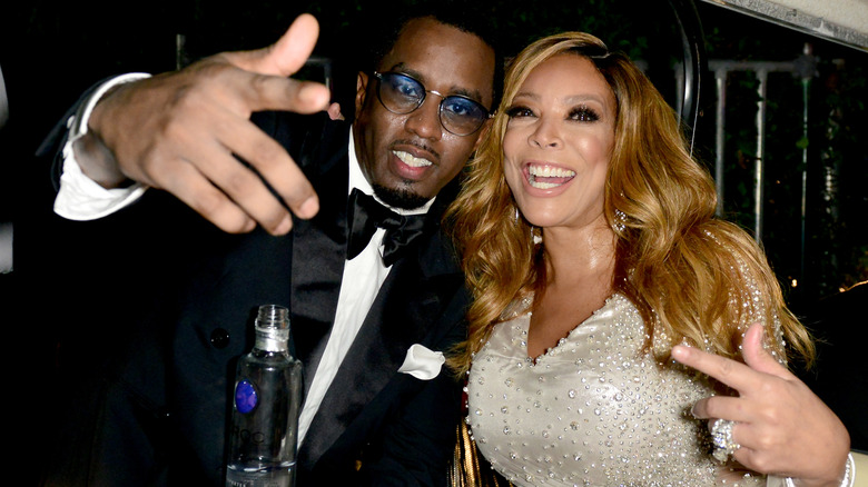 Wendy Williams and Diddy posing together at an event