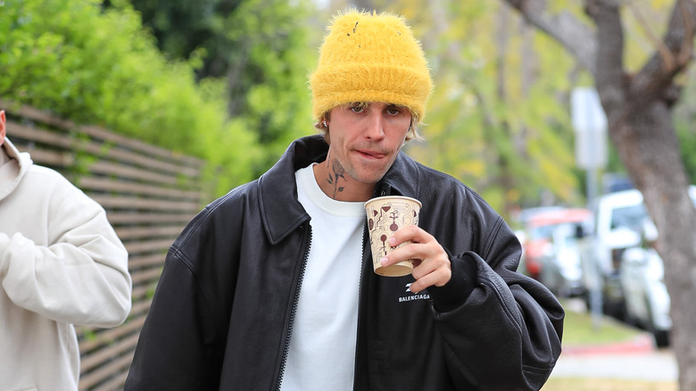 Justin Bieber drinking coffee