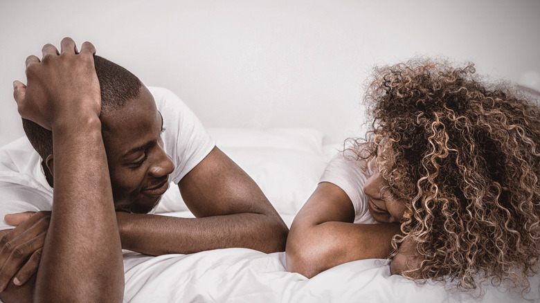 couple talking before going to bed