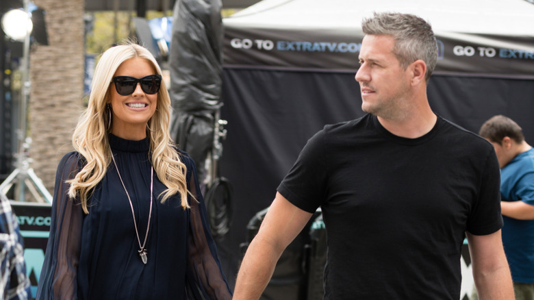 Christina Haack in sunglasses and Ant Anstead with a black shirt on outside