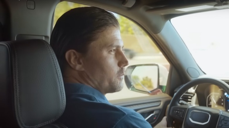 Josh Hall driving a car in an HGTV sneak peak