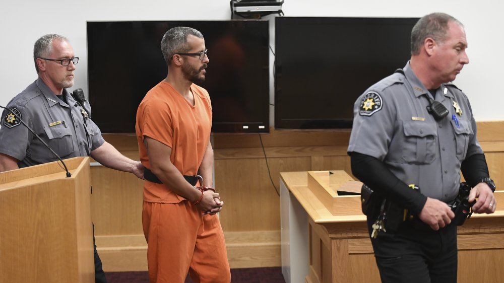 Chris Watts and two police officers in court, as seen in American Murder: The Family Next Door