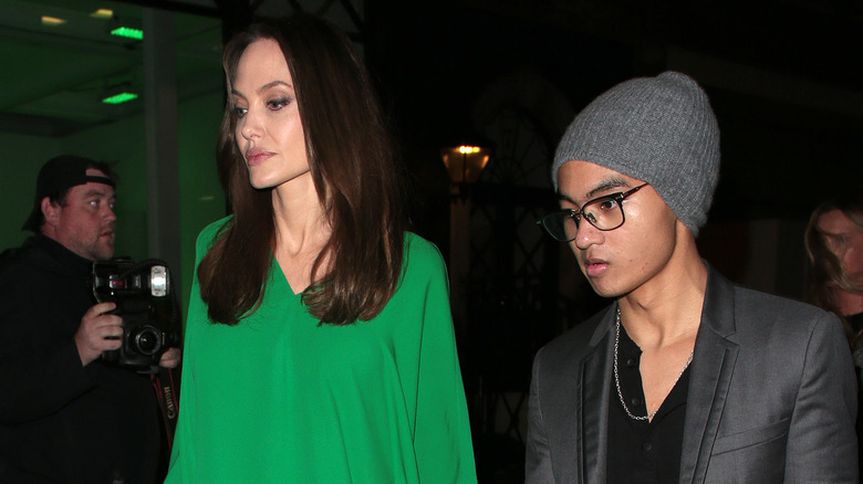 Angelina Jolie and Maddox Pitt leaving an event