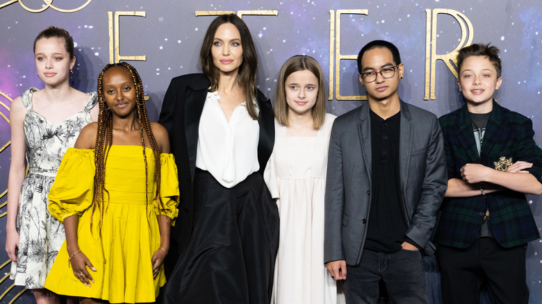 Angelina Jolie with her kids at a red carpet