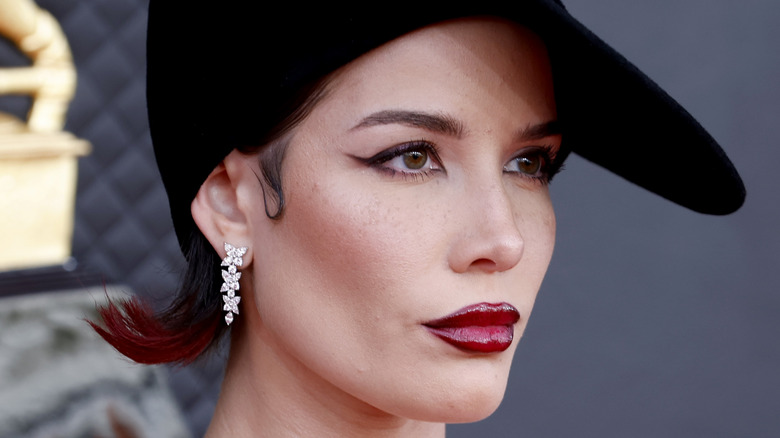 Halsey black hat red lips