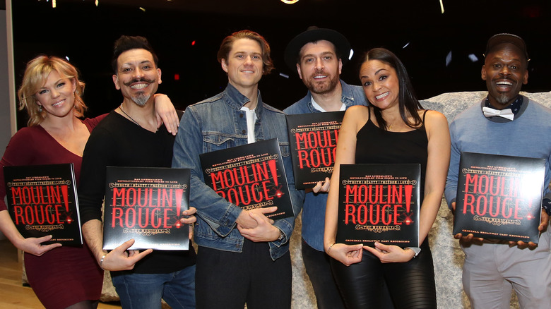 Karen Olivo posing with Moulin Rogue! cast