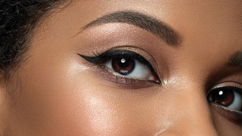 Close-up image of a woman with permanent eyeliner