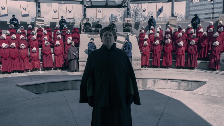 Aunt Lydia in front of Handmaids