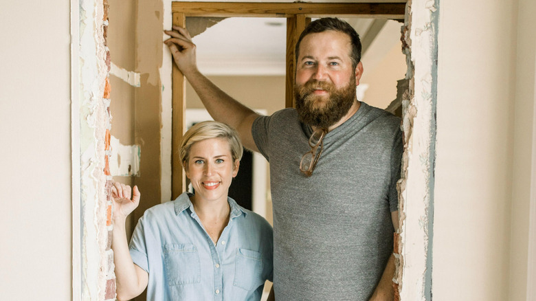 Ben and Erin Napier pose in a promo shot for Home Town