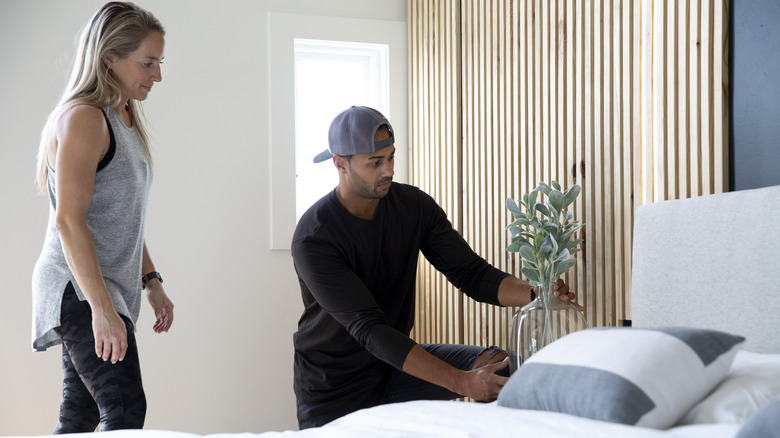 Brooke and Brice Gilliam arranging decor