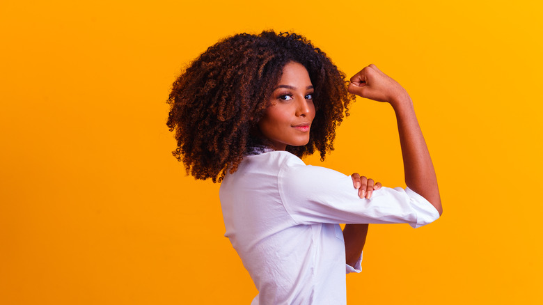 Woman showing strength