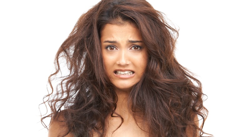 Woman with frizzy hair