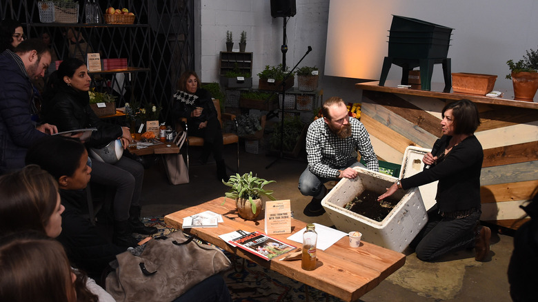 People meet to discuss composting