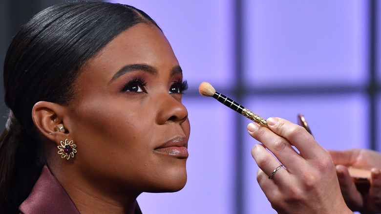 Candace Owens getting makeup done