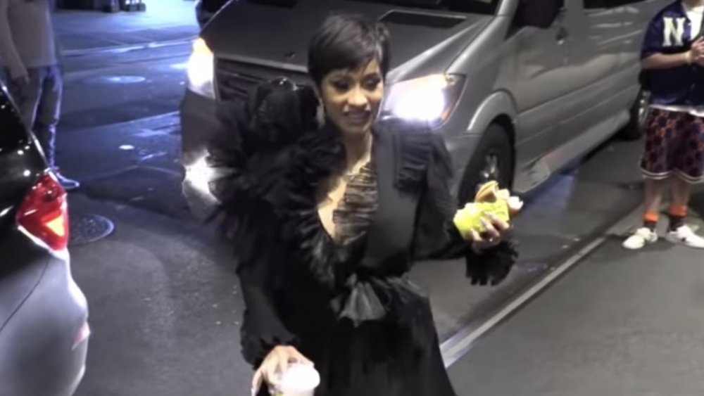 Cardi B eating a McDonald's burger