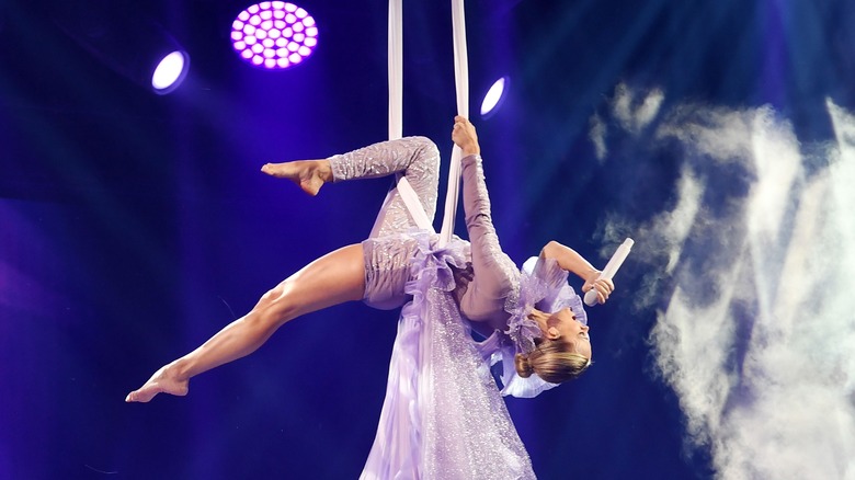Carrie Underwood performing with silks