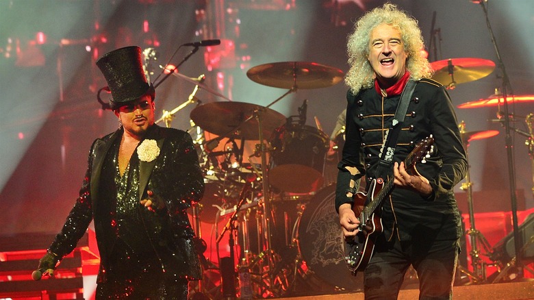 Adam Lambert performing with Brian May