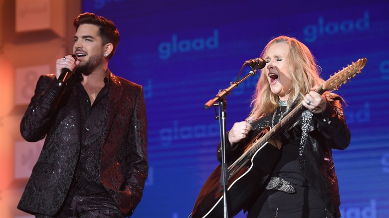 Adam Lambert performing with Melissa Etheridge