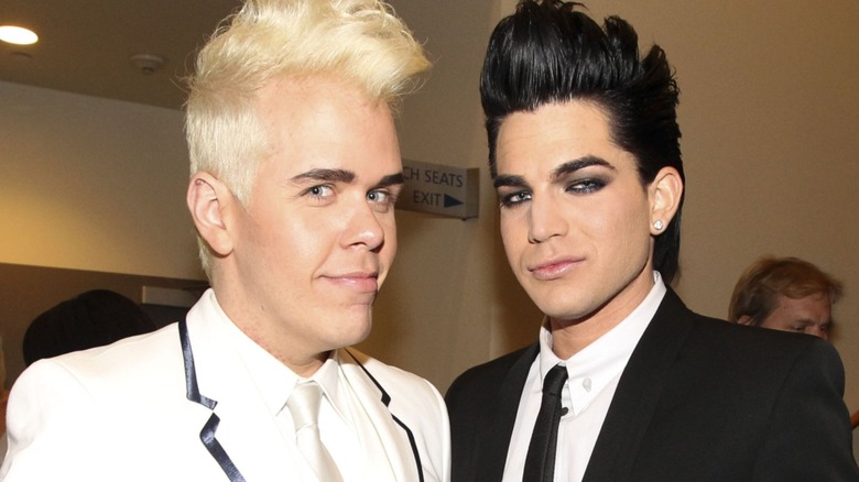 Perez Hilton posing with Adam Lambert