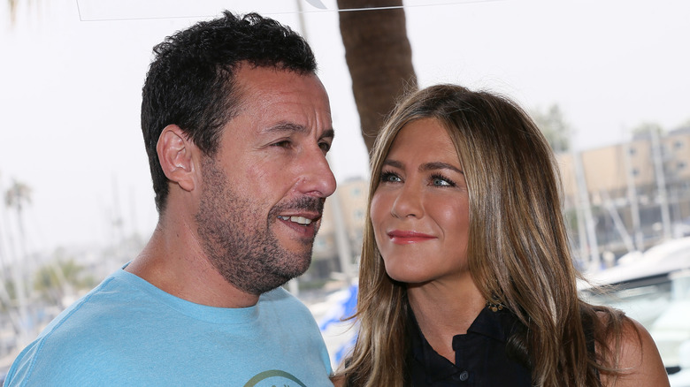 Adam Sandler and Jennifer Aniston posing at a photocall of Netflix's "Murder Mystery" at the Ritz Carlton Marina Del Rey on June 11, 2019 in Marina del Rey, California