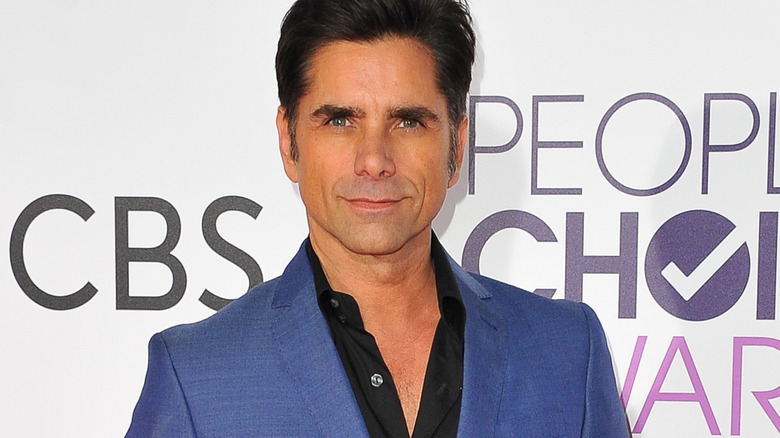 John Stamos on the red carpet. 