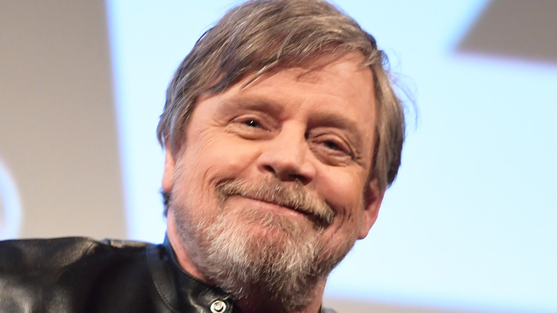 Mark Hamill smiling onstage