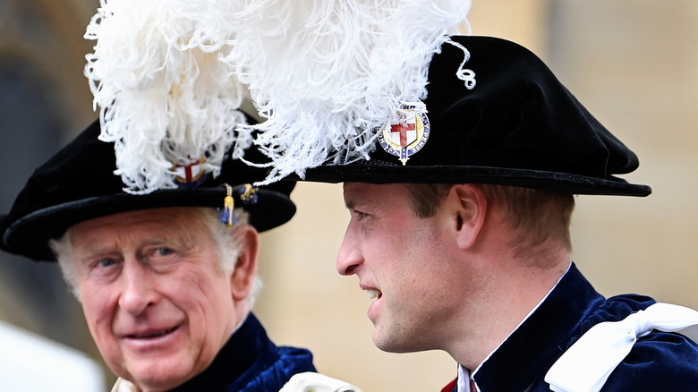Prince Charles and Prince William smiling 
