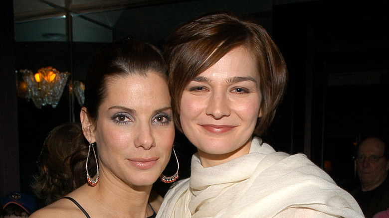 Sandra Bullock and Heather Burns smiling