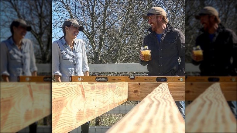 Chip and Joanna Gaines during filming of Fixer Upper
