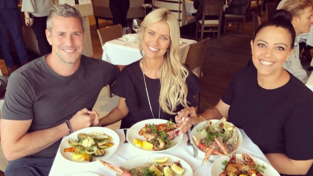 Christina Anstead dining with her husband and a friend