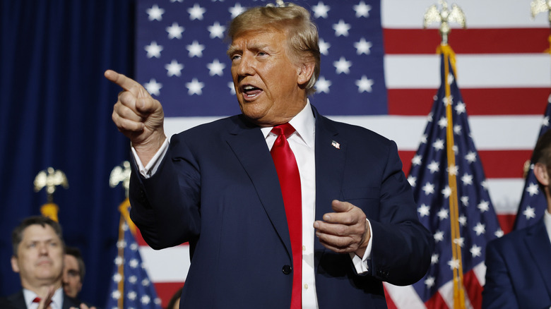 Donald Trump frowning at a rally 